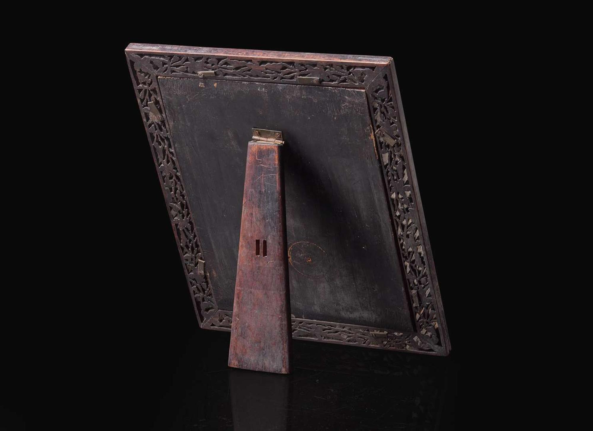 A Chinese carved and pierced pale celadon jade "Dragon" plaque 青玉龍紋硯屏