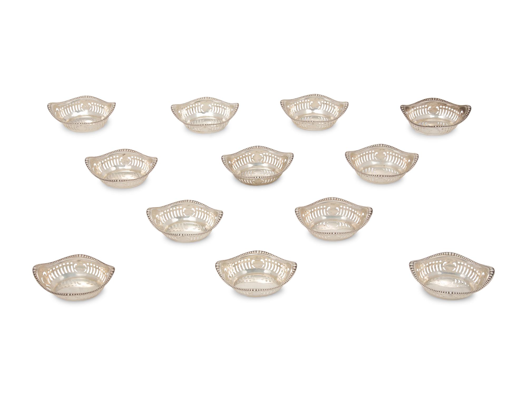 A Set of Twelve American Silver Nut Dishes