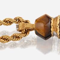 A gold, tiger's eye quartz, and diamond sautoir, Kutchinsky c. 1971