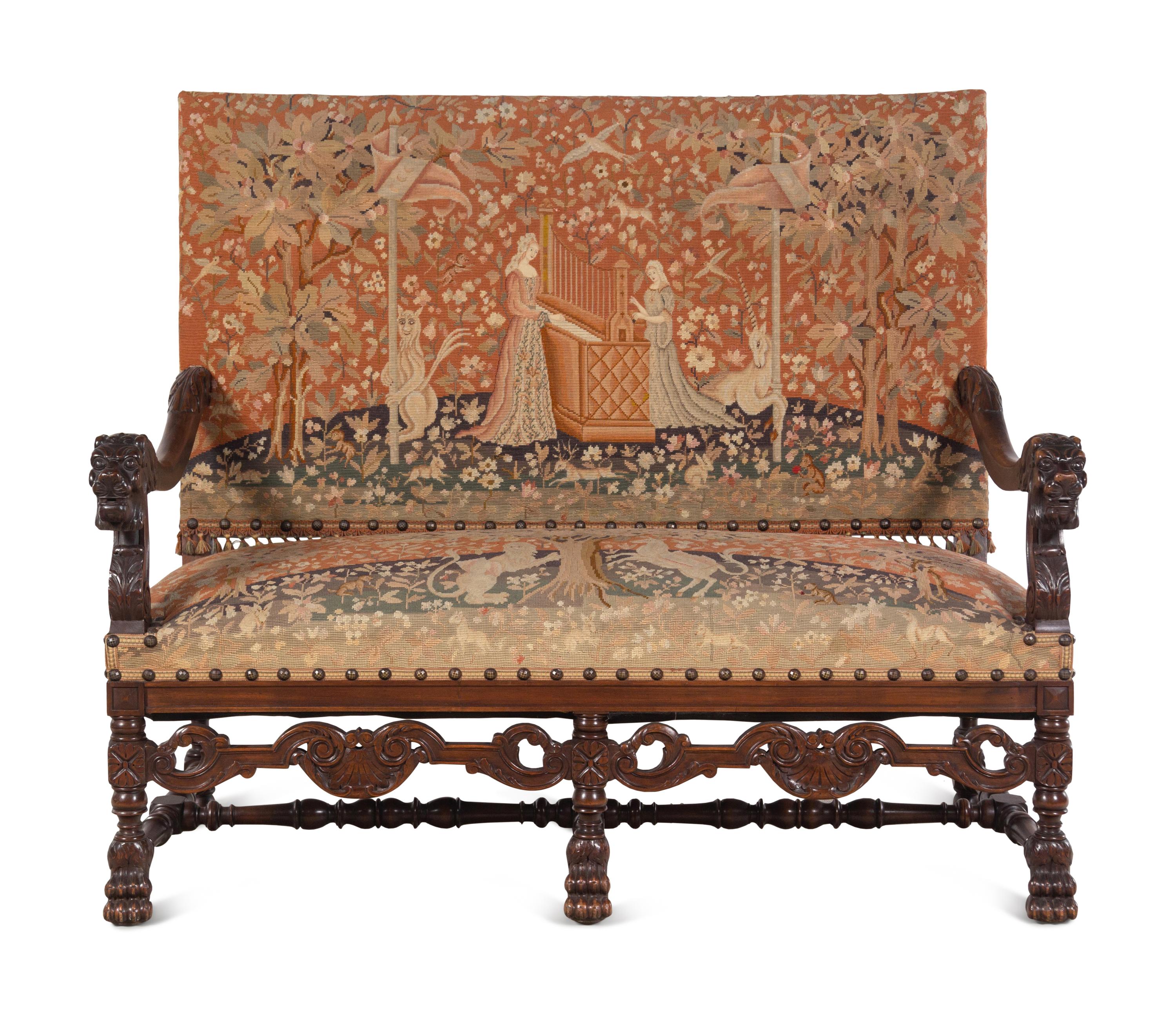 A Renaissance Revival Carved Walnut Parlor Suite