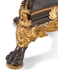 A Renaissance Style Parcel Gilt Bronze Glass-Top Center Table