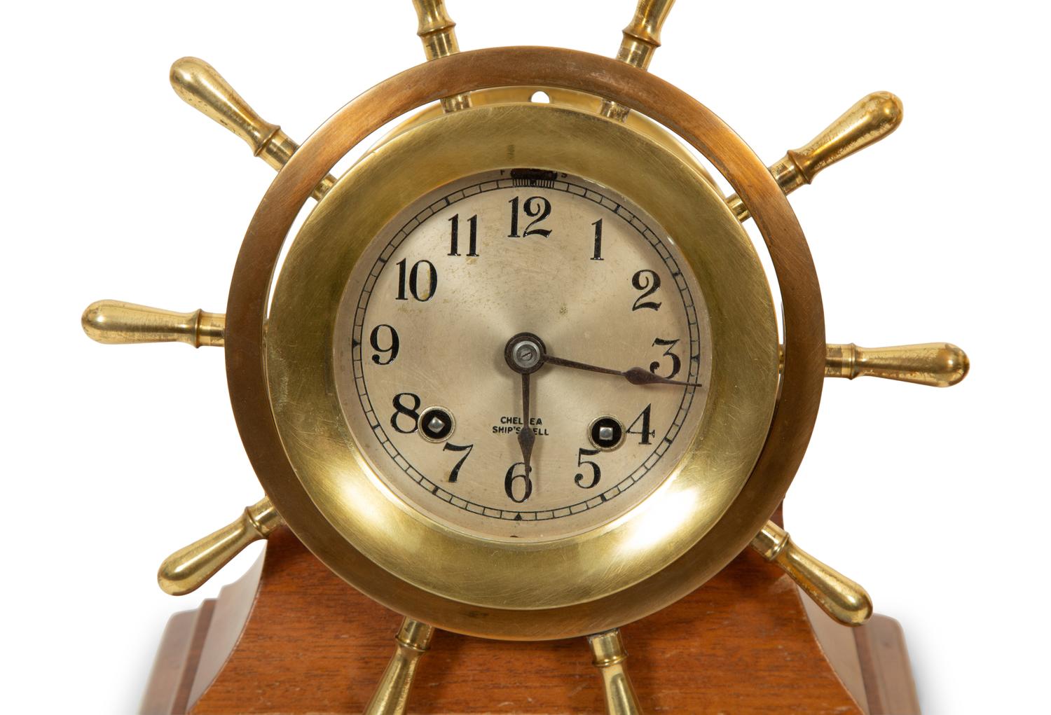 A Chelsea Ship's Wheel Clock and Matching Barometer