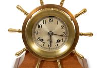A Chelsea Ship's Wheel Clock and Matching Barometer