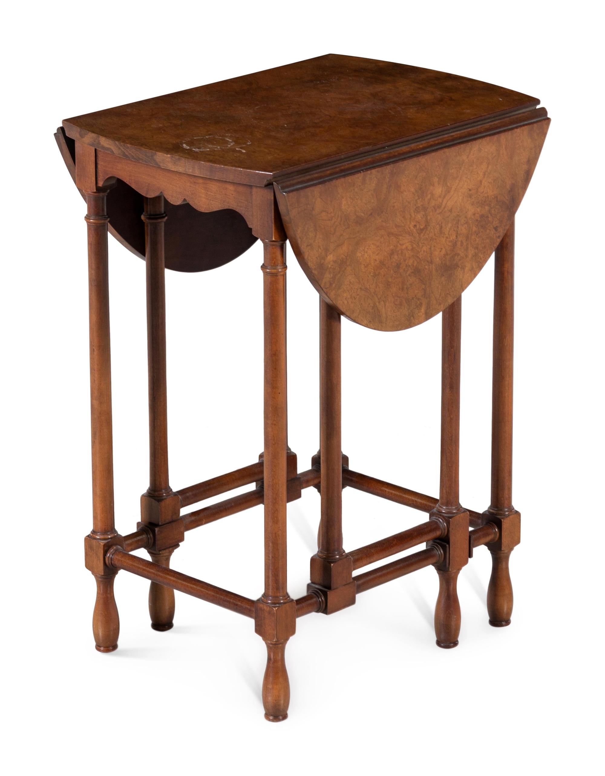 A George III Style Gate-Leg Table — BAKER