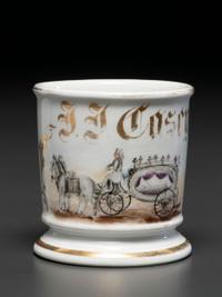 A Porcelain Occupational Shaving Mug Depicting a Horse-Drawn Hearse