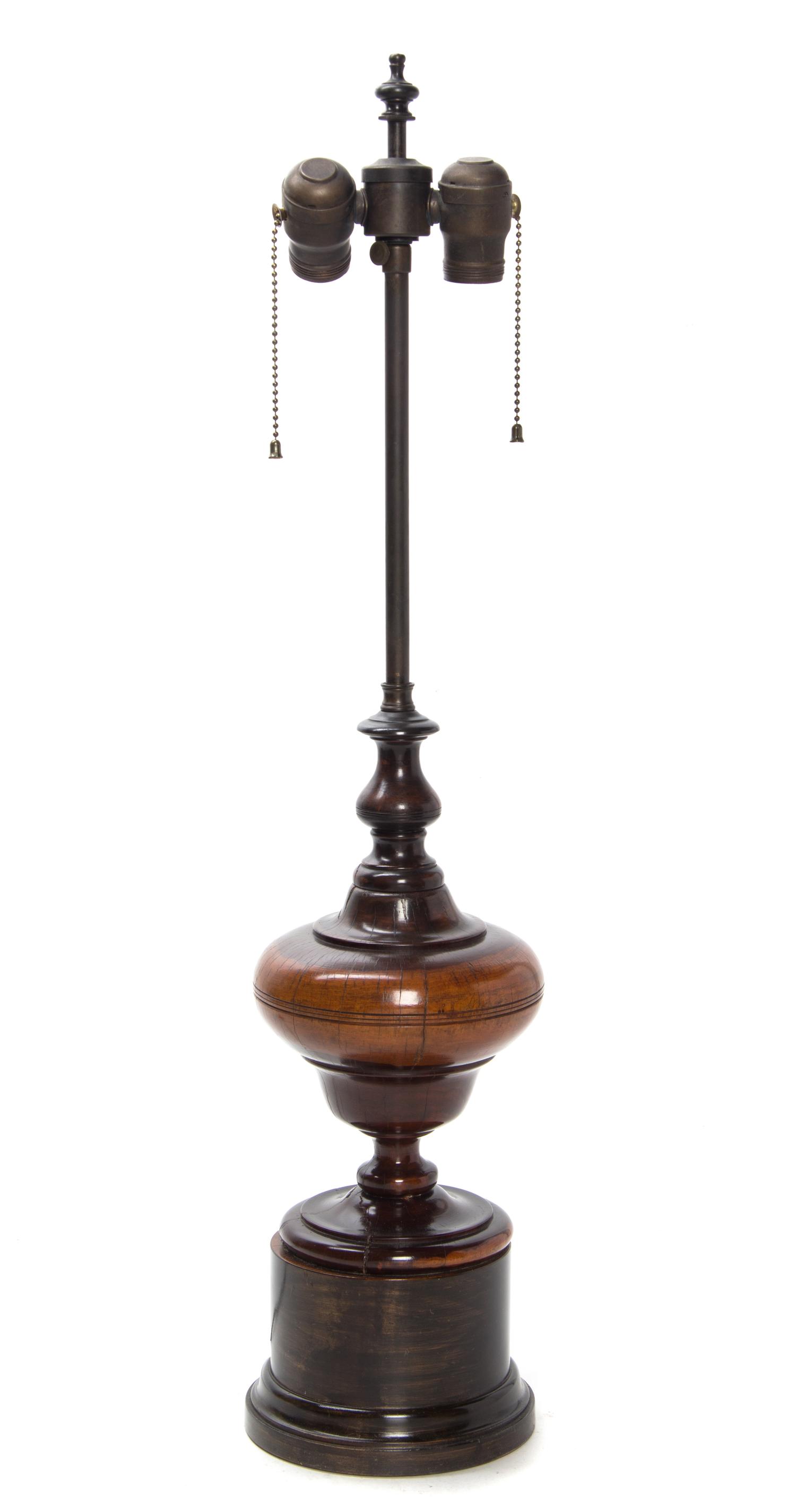 An English Turned Wood Urn Height overall 29 1/4 inches.