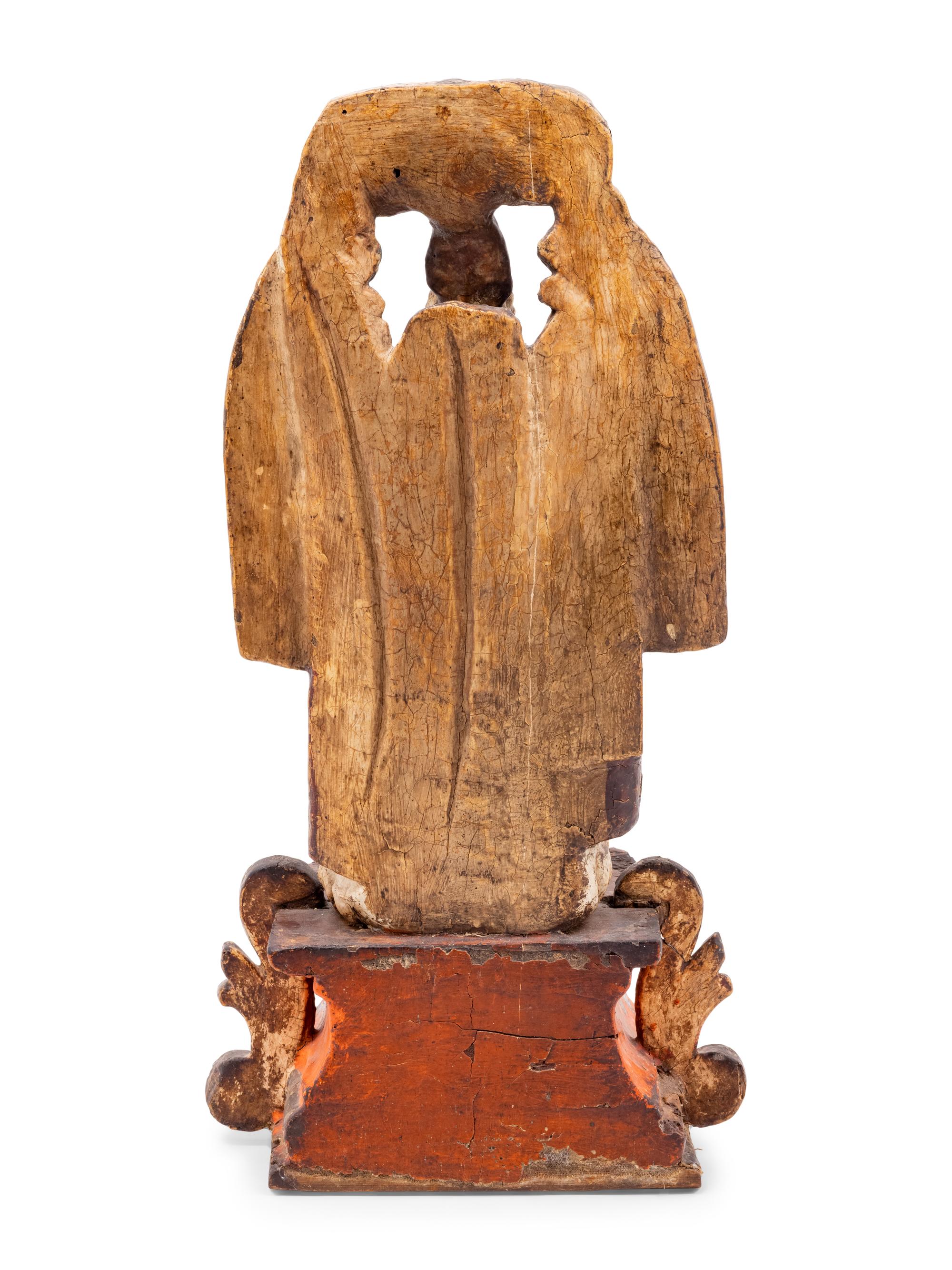 A Spanish Carved and Painted Wood Santos Group