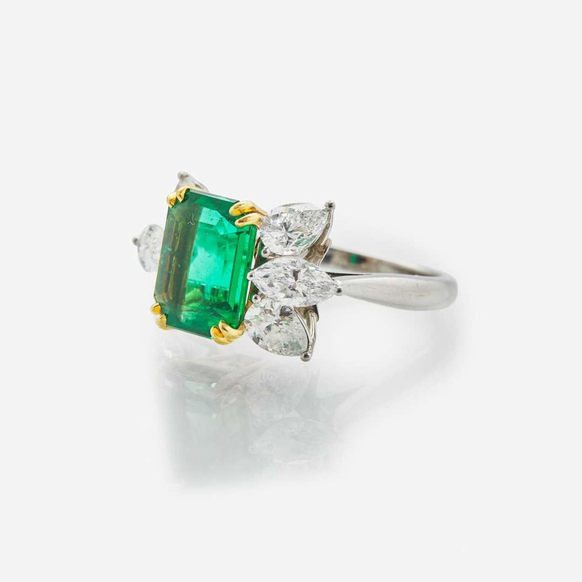 A Tiffany & Co. Platinum, Diamond, and Emerald Ring