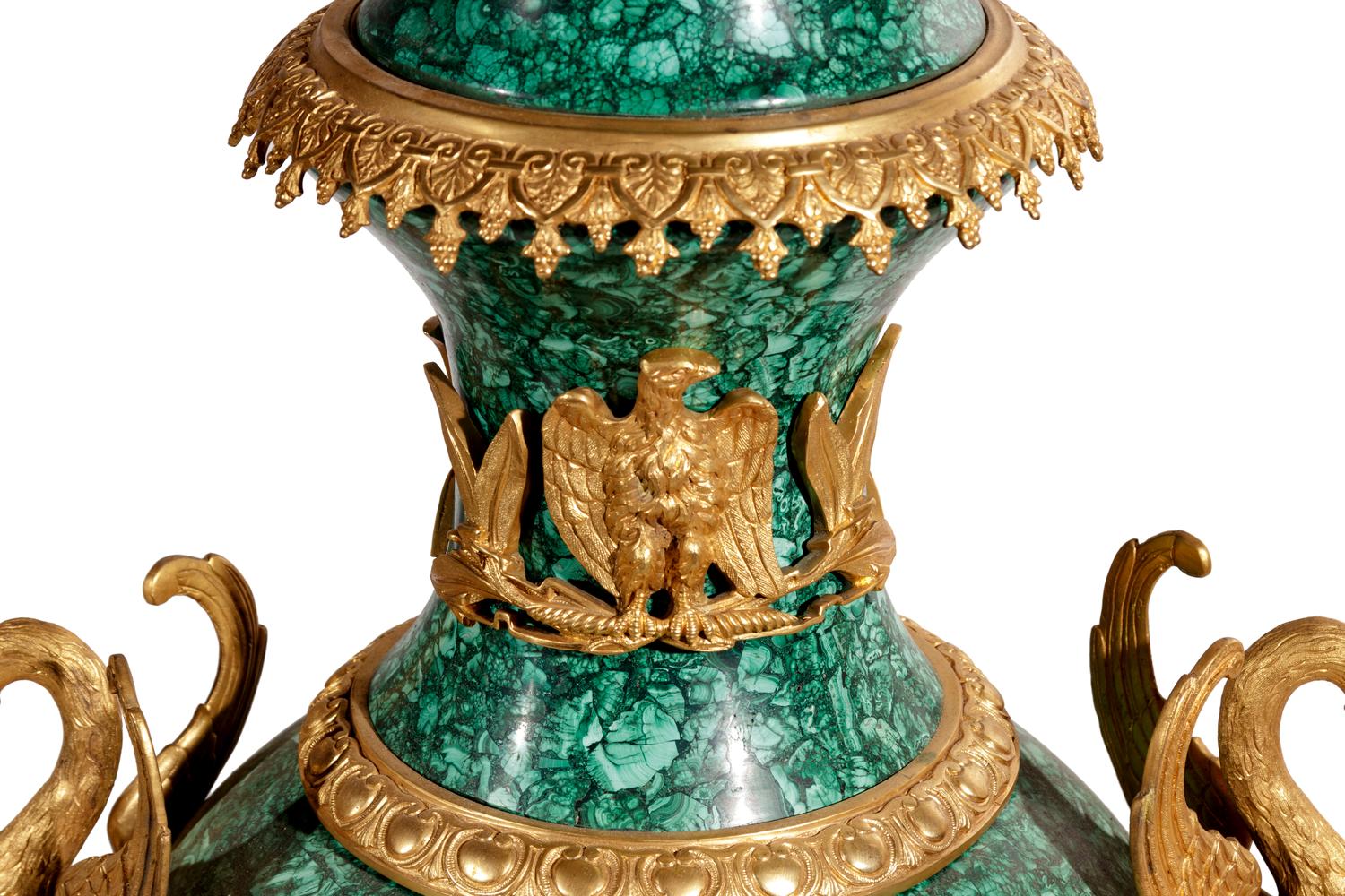 A Pair of Empire Style Gilt Bronze Mounted Malachite Veneered Urns