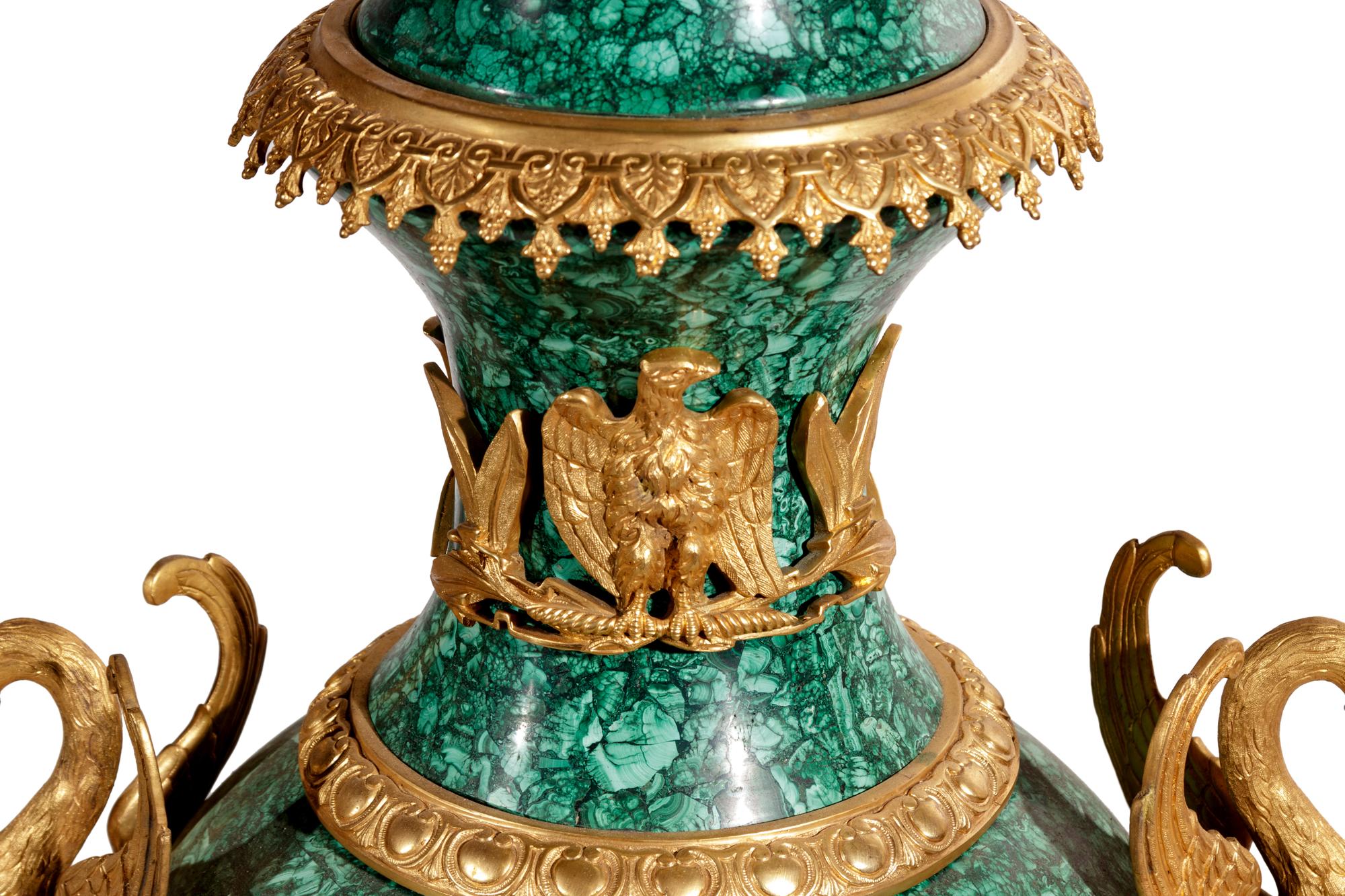 A Pair of Empire Style Gilt Bronze Mounted Malachite Veneered Urns