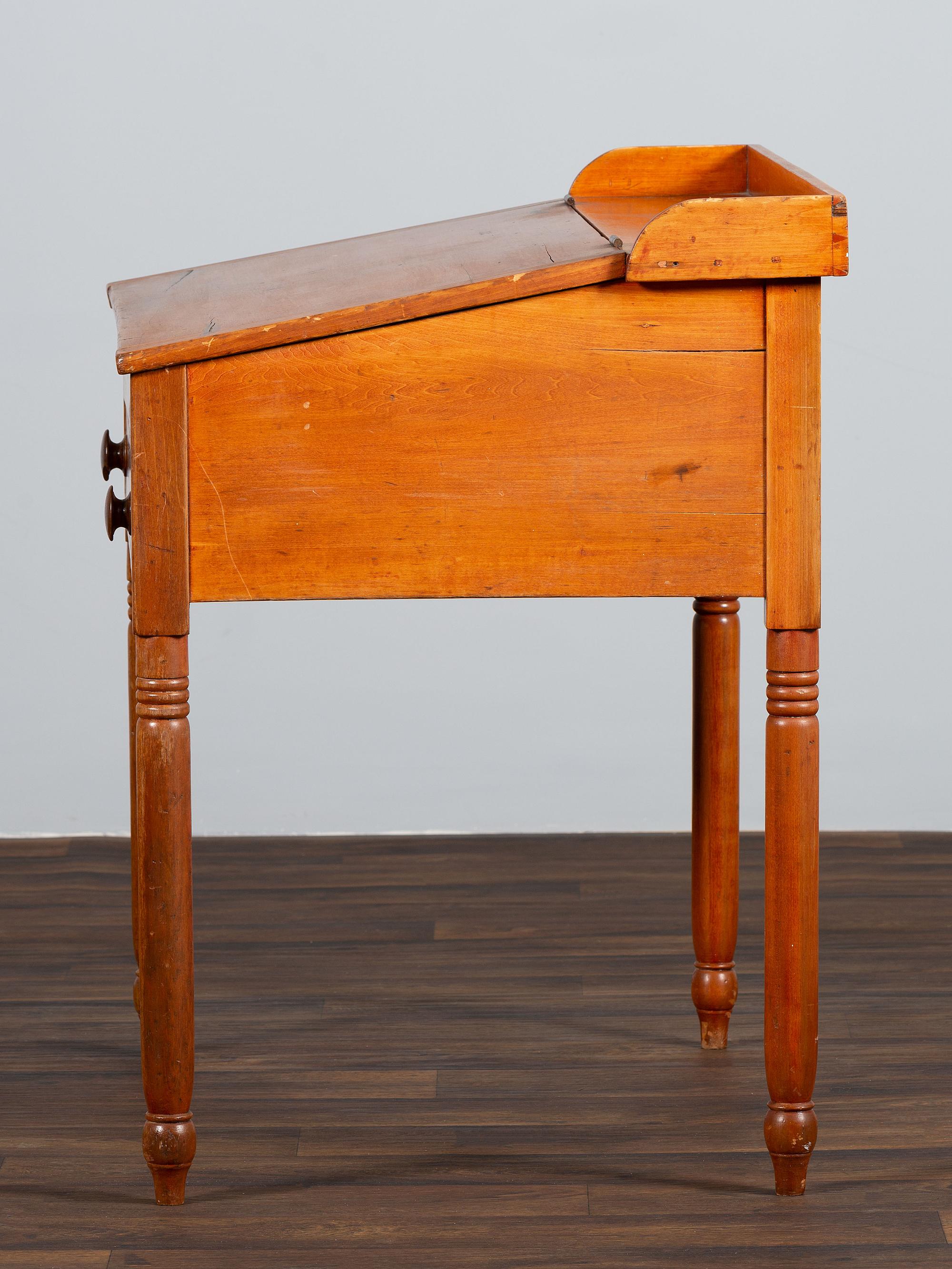 A Late Federal Red-Stained Pine One-Drawer Slant-Lid Schoolmaster's Desk