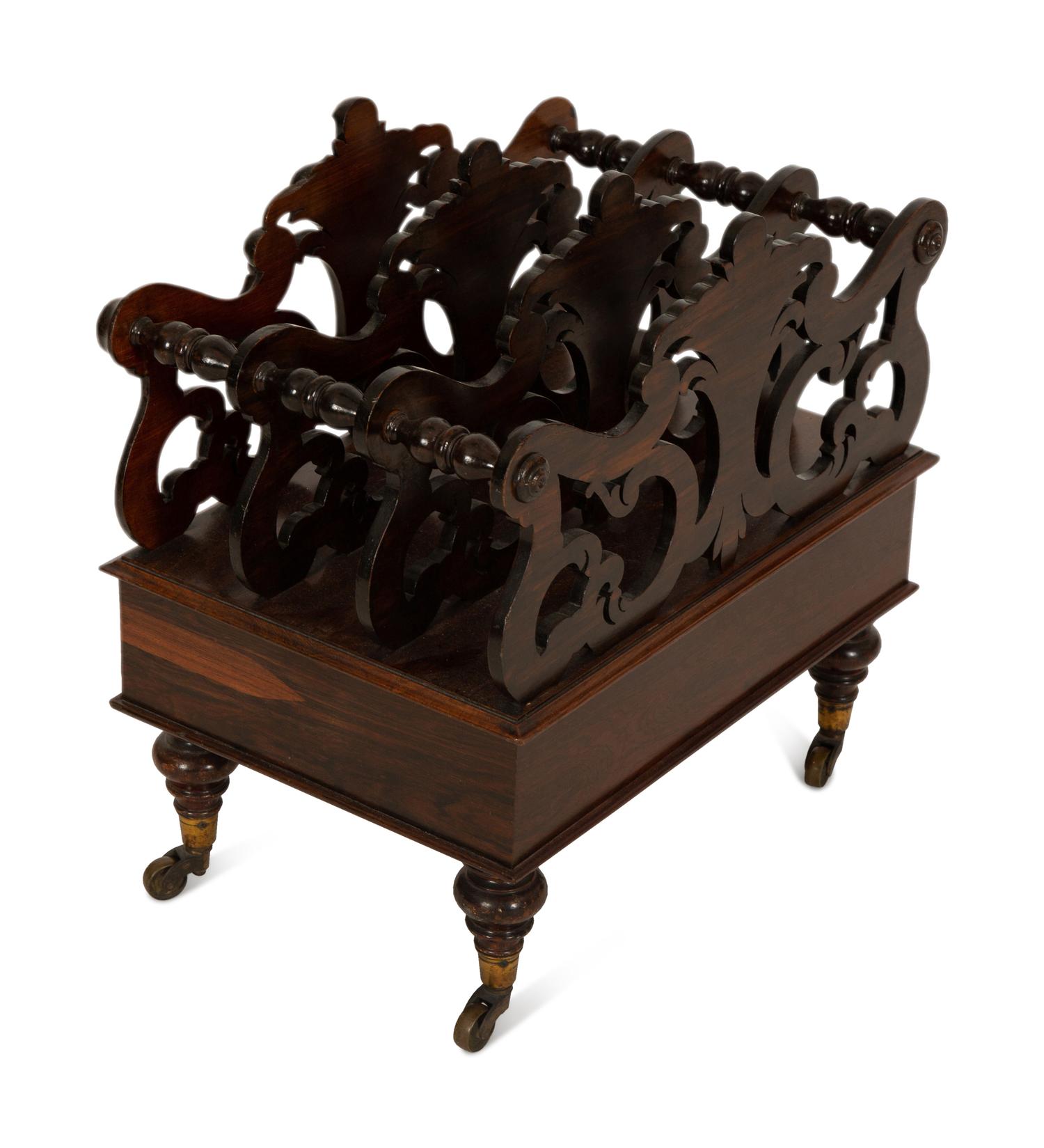 A Late Regency Carved Mahogany Canterbury