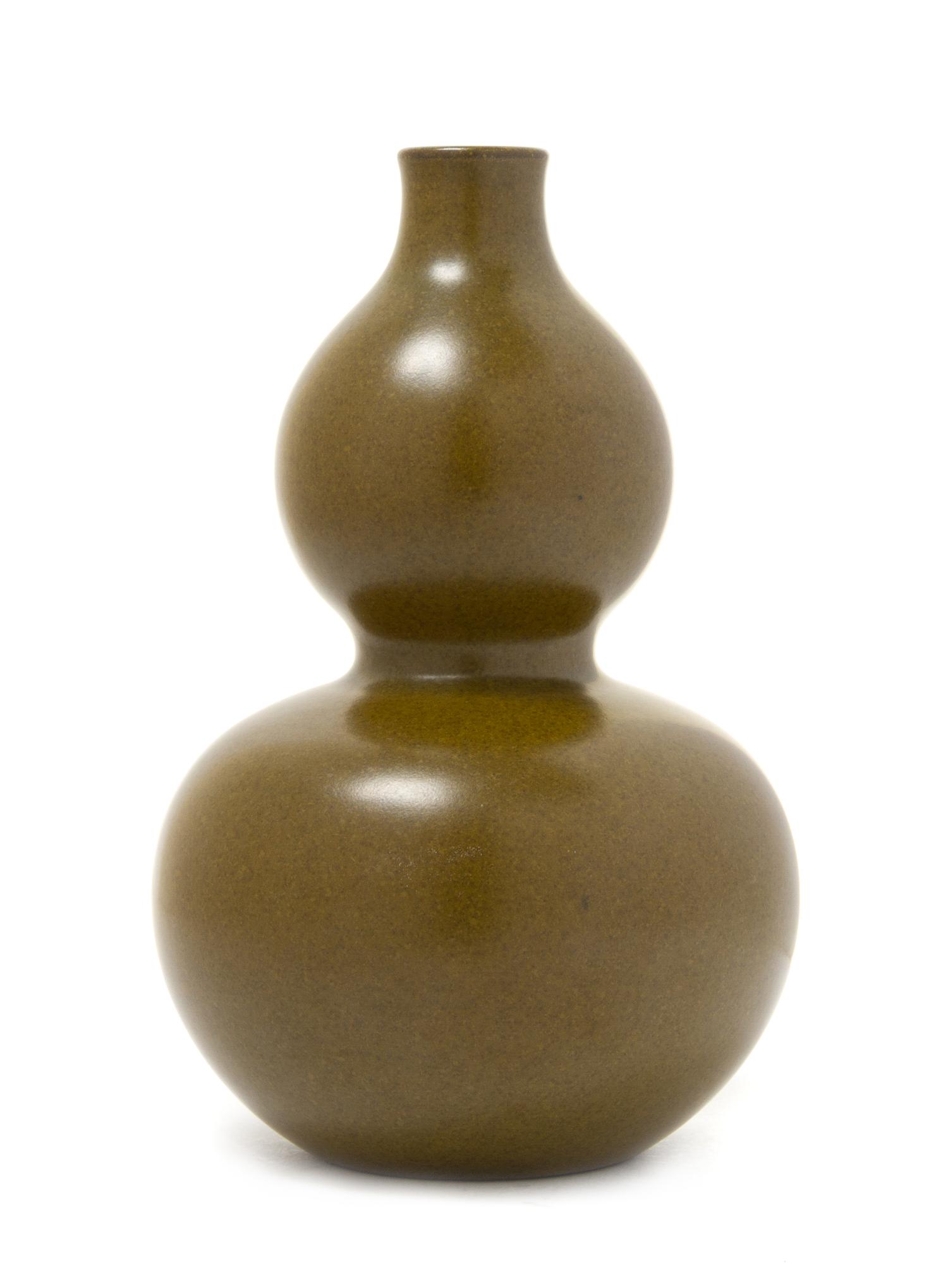 A Teadust Glazed Porcelain Vase Height 7 1/2 inches.