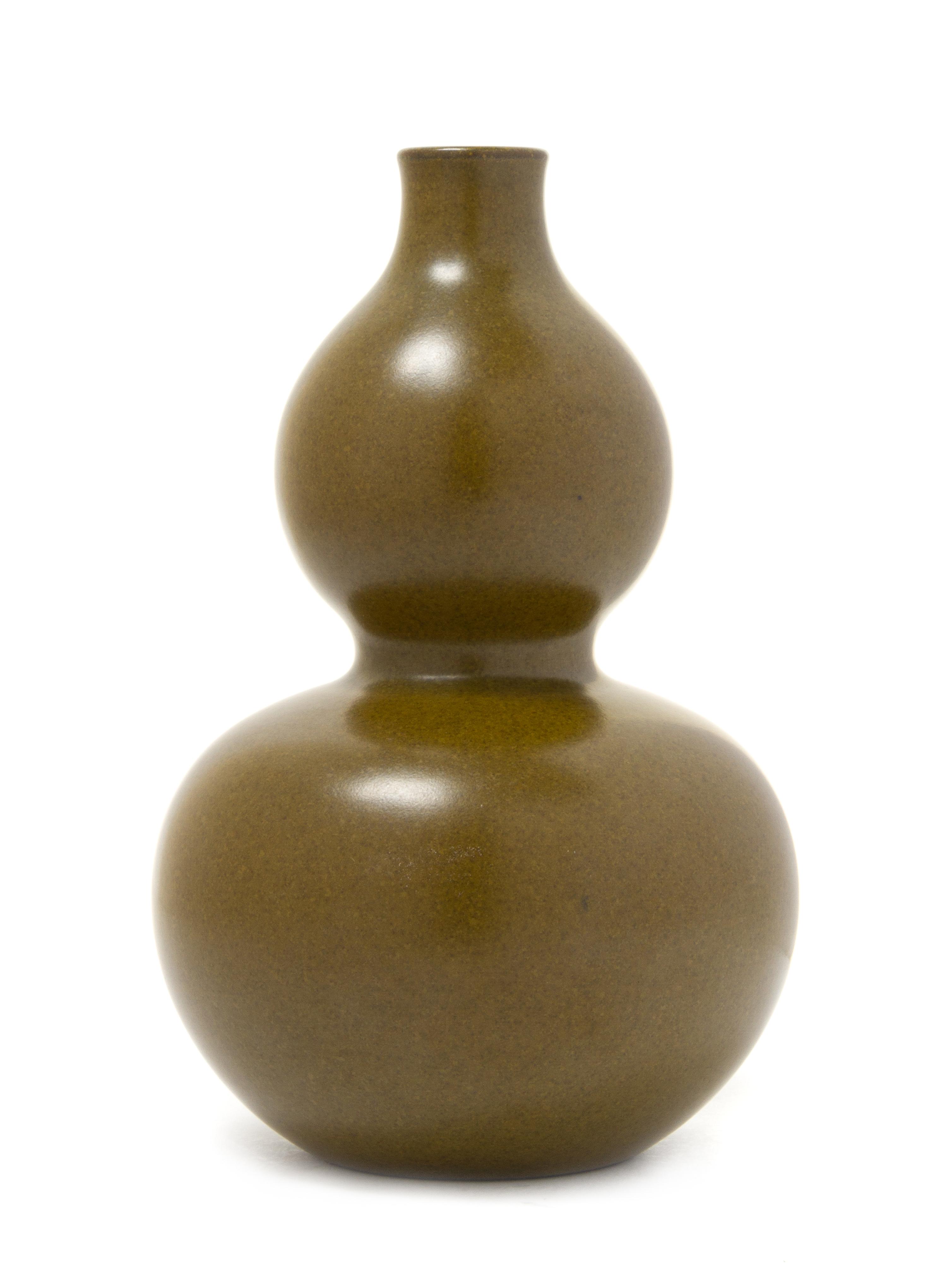 A Teadust Glazed Porcelain Vase Height 7 1/2 inches.