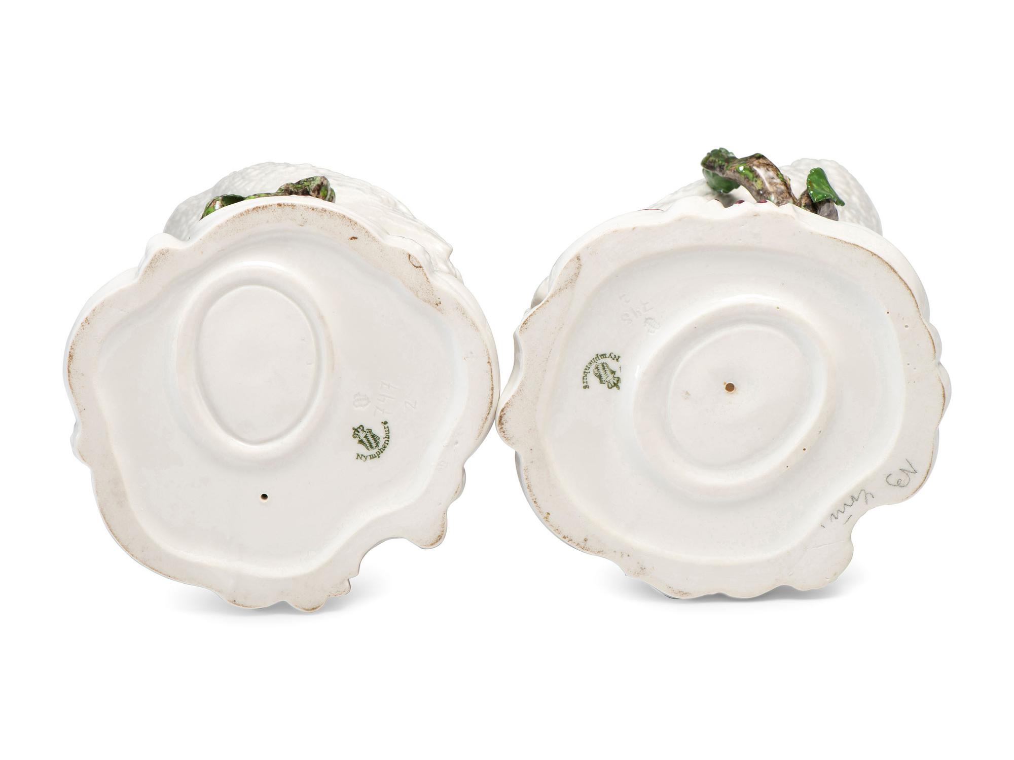 A Pair of Nymphenburg Porcelain Cockatoos