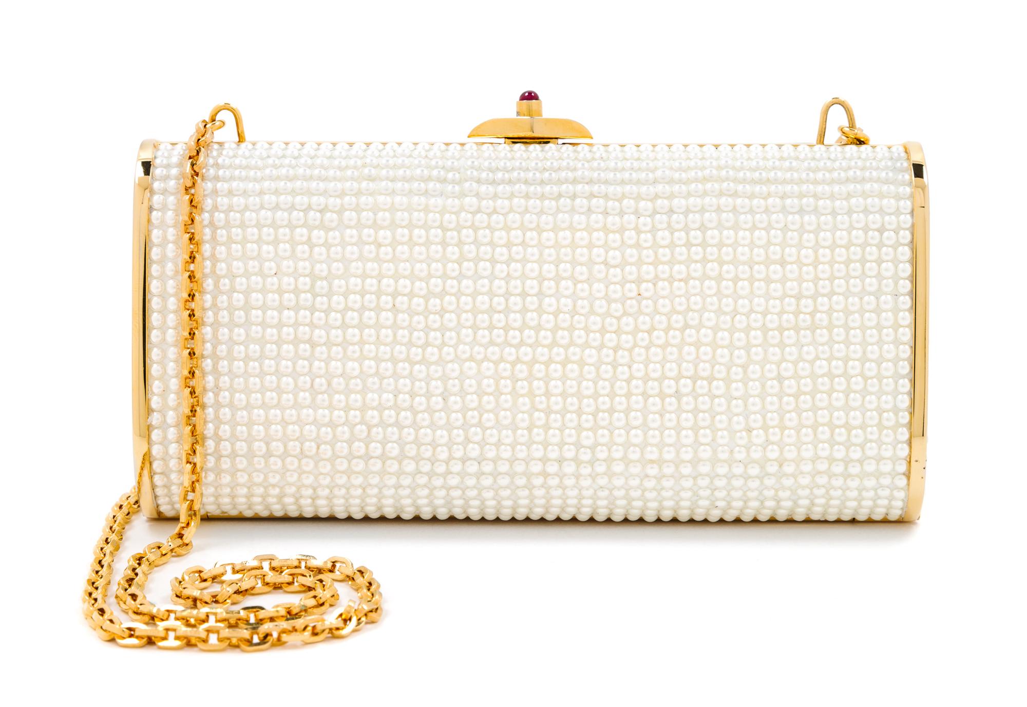 A Judith Leiber Oblong Pearl Minaudiere, 5.75" x 3" x 1.25"; Strap drop: 25".