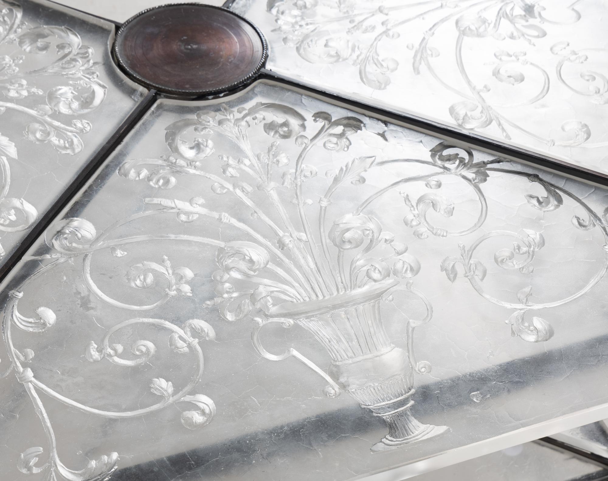 An Etched Glass-Top Patinated Metal Cocktail Table