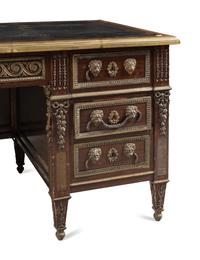 A Louis XVI Style Gilt Metal Mounted Mahogany Pedestal Desk