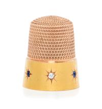 An American 14-Karat Gold, Diamond and Sapphire Thimble, Simons Bros., Philadelphia, PA, the dimpled top and body above a plain band wo