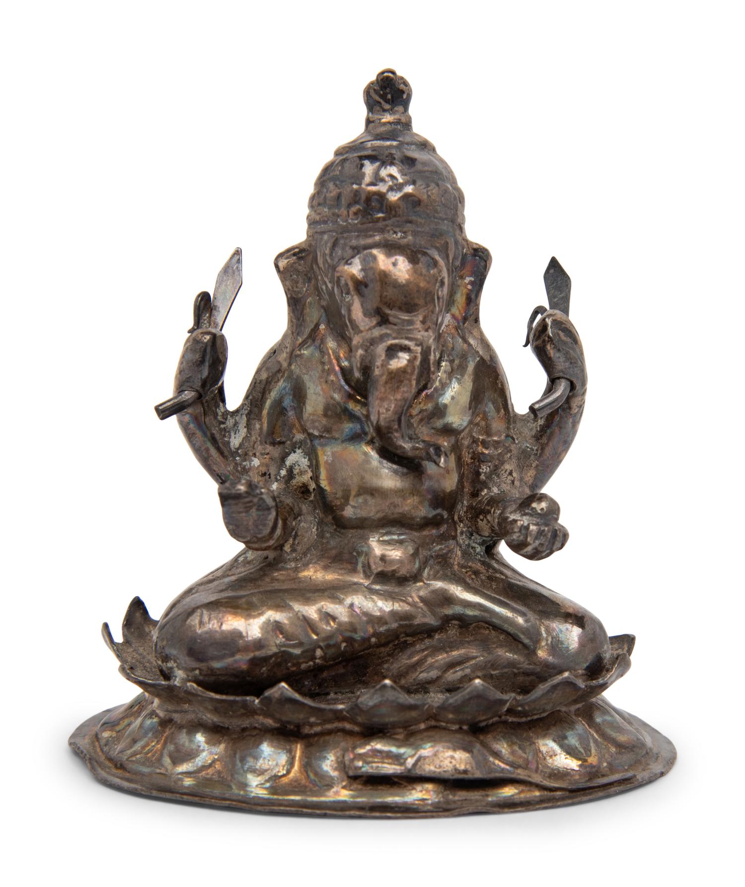 A Small Southeast Asian Silvered Metal Figure of Ganesha