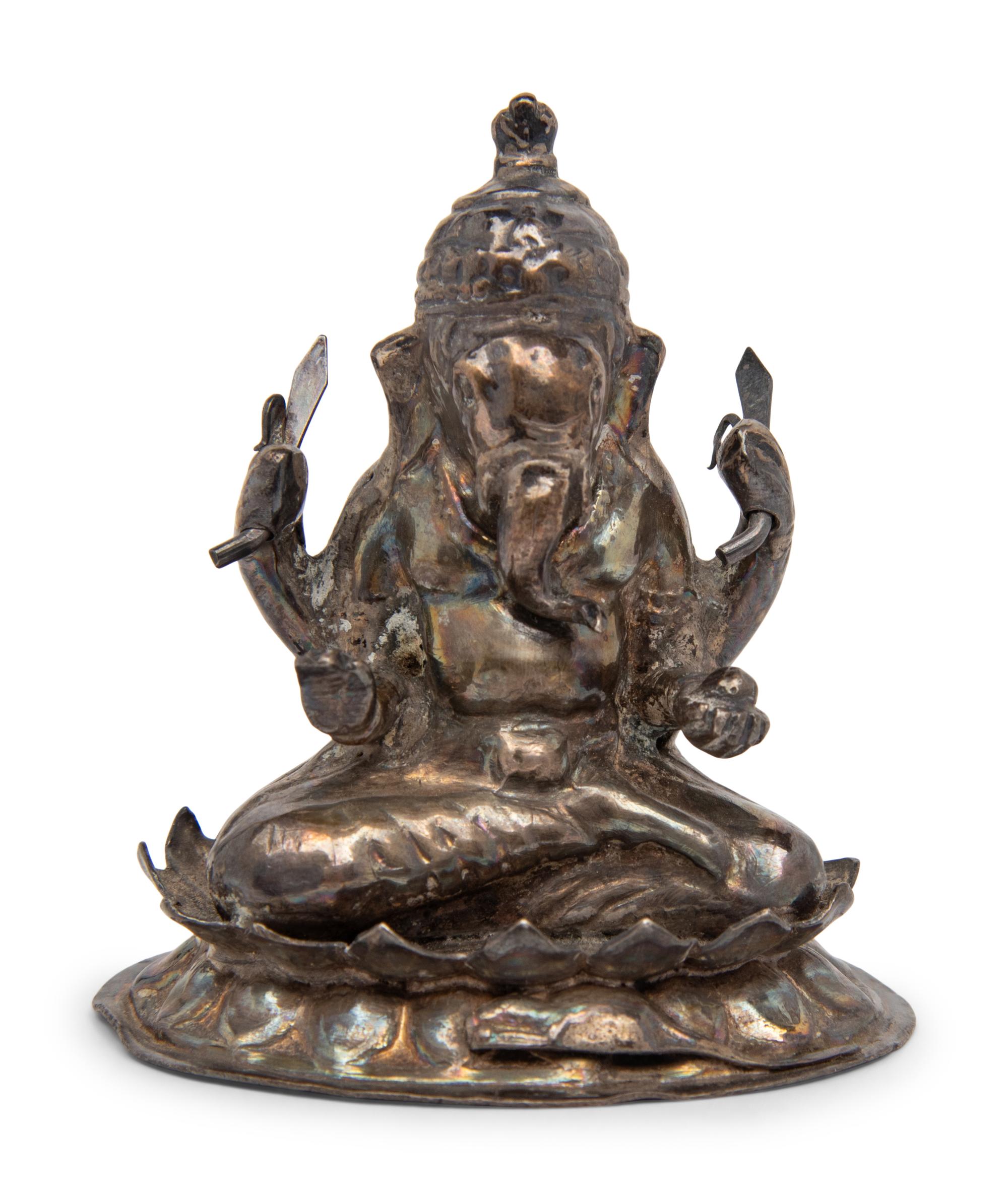 A Small Southeast Asian Silvered Metal Figure of Ganesha