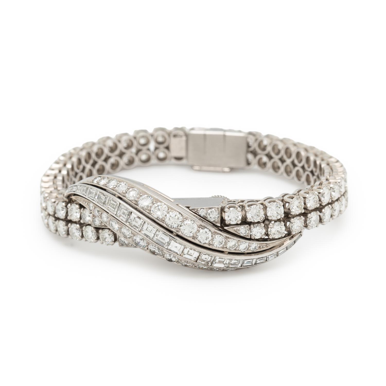 AUDEMARS PIGUET, DIAMOND AND PLATINUM SURPRISE WATCH
