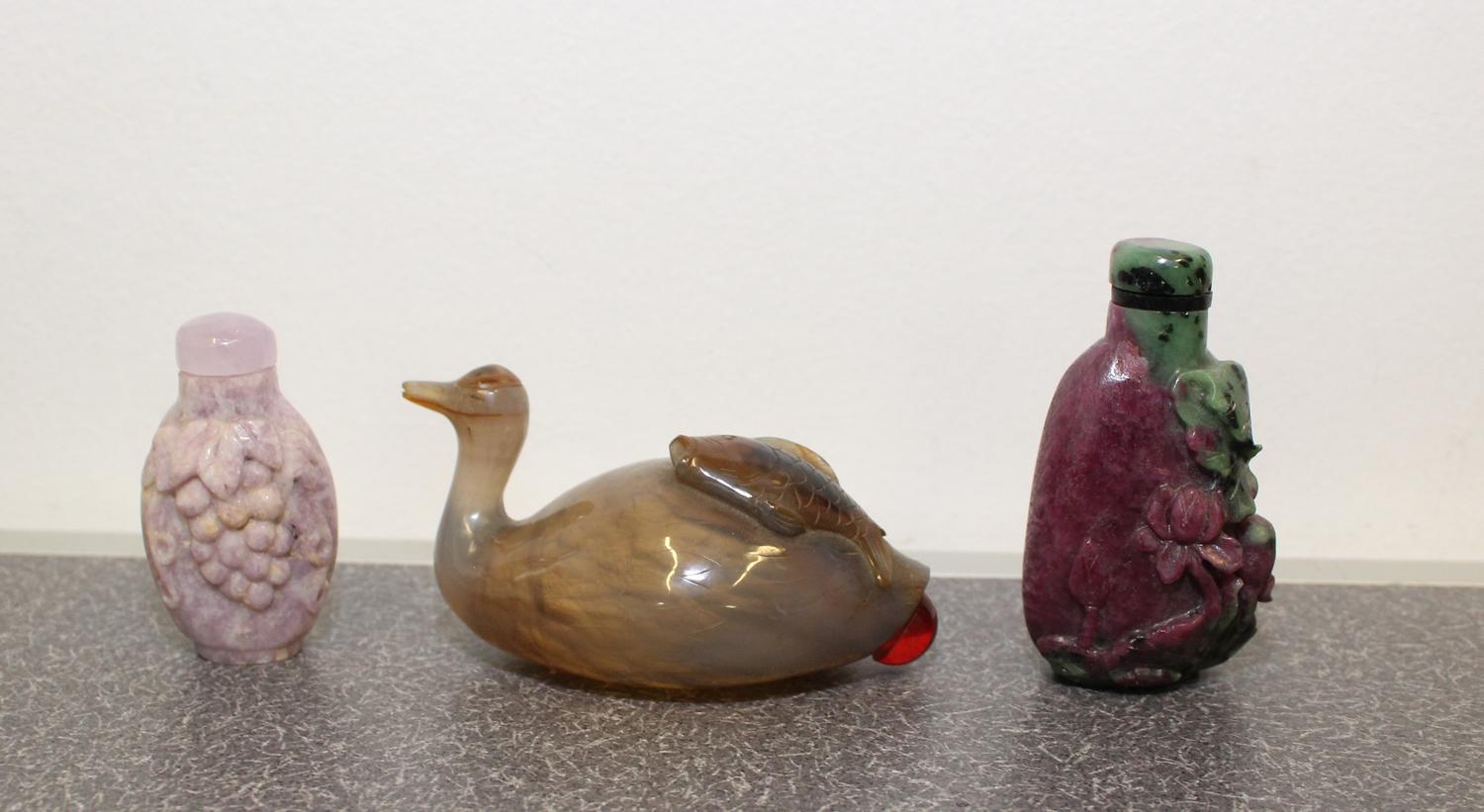 Three Carved Snuff Bottles Height of tallest 2 3/4 inches.