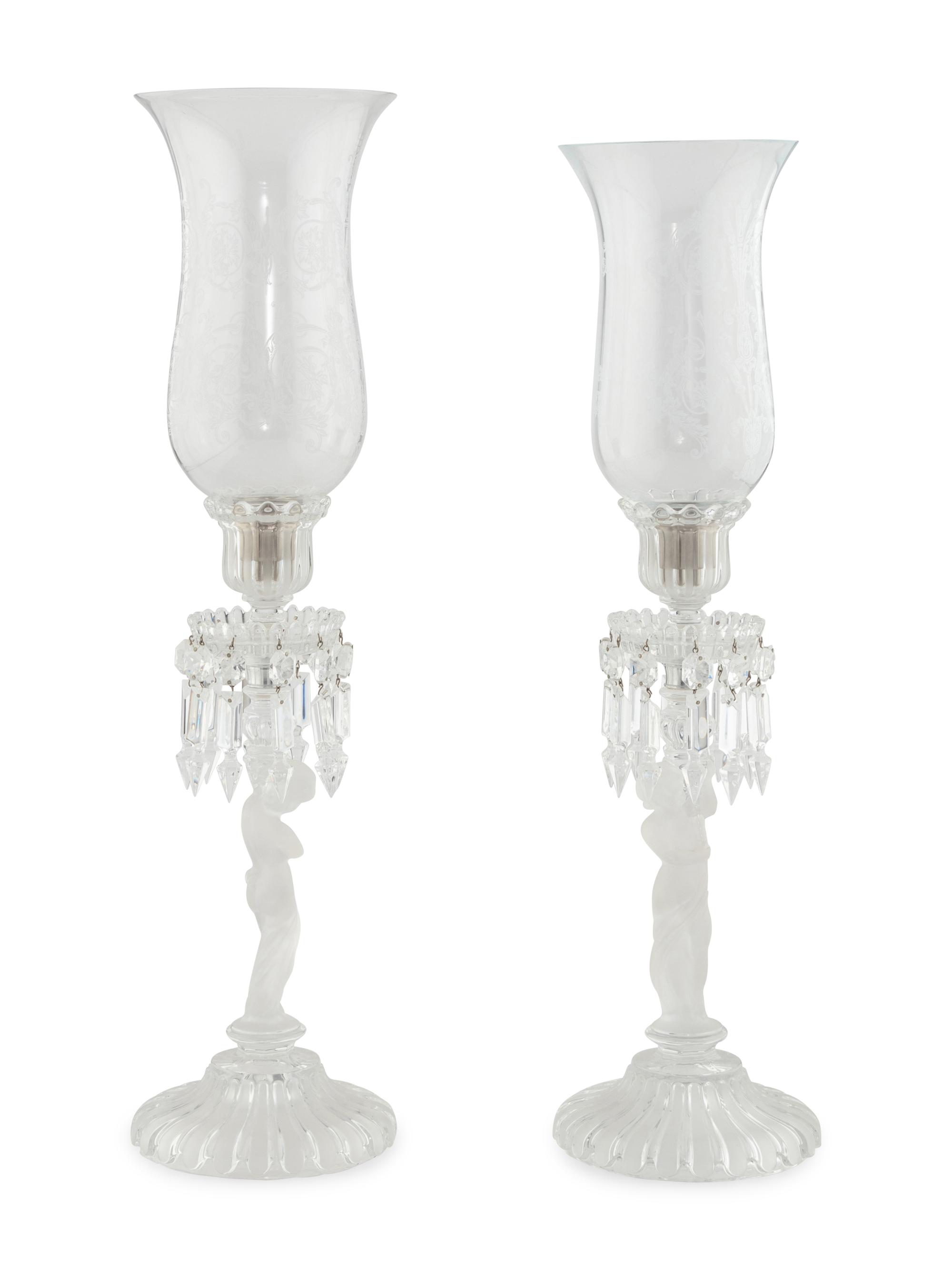 A Pair of Figural Molded Glass Hurricane Lamps