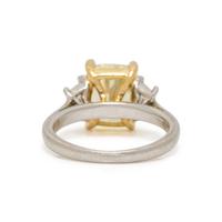 FANCY LIGHT YELLOW DIAMOND AND DIAMOND RING