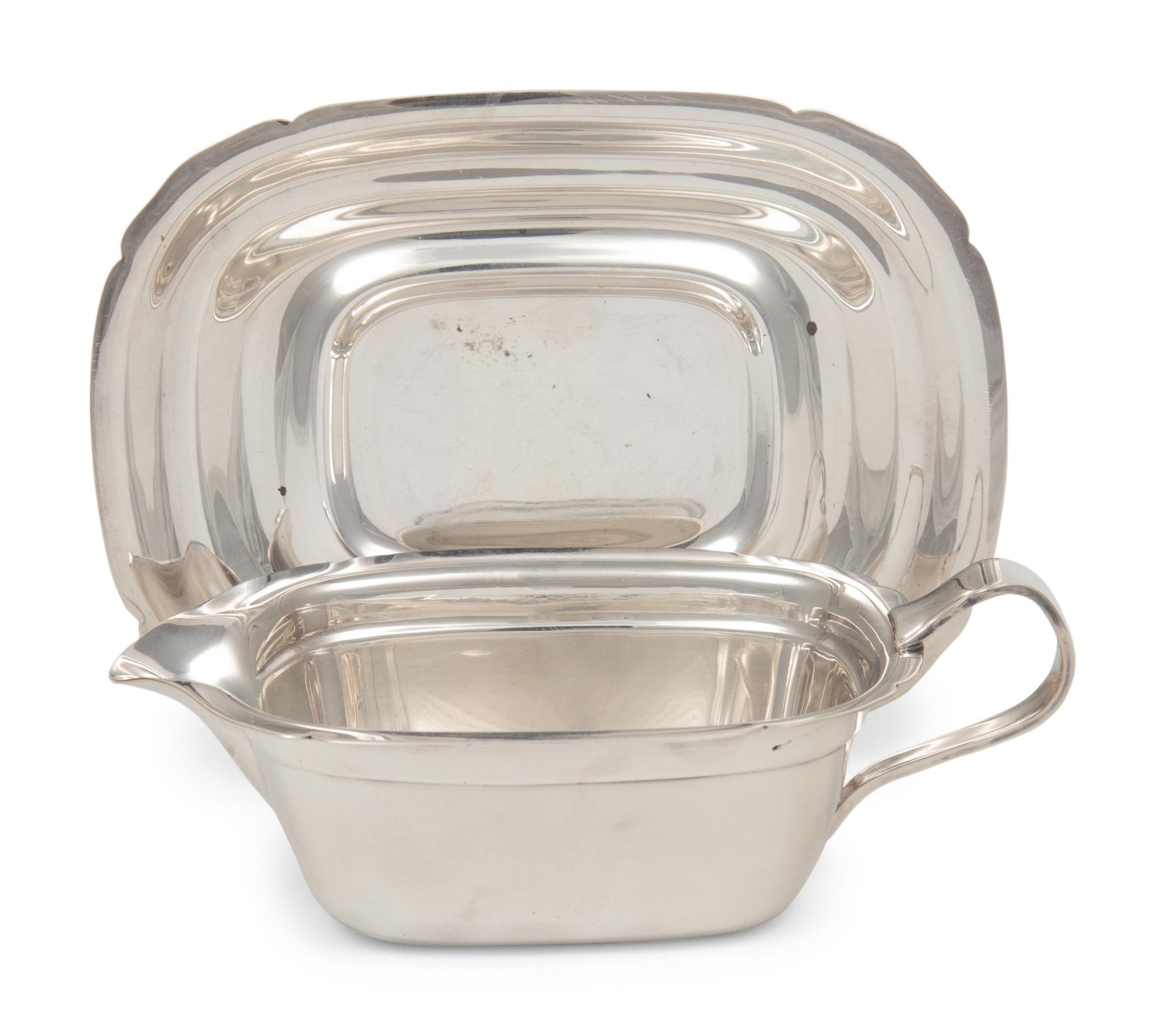 A Reed & Barton Silver-Plate Creamer and Underplate