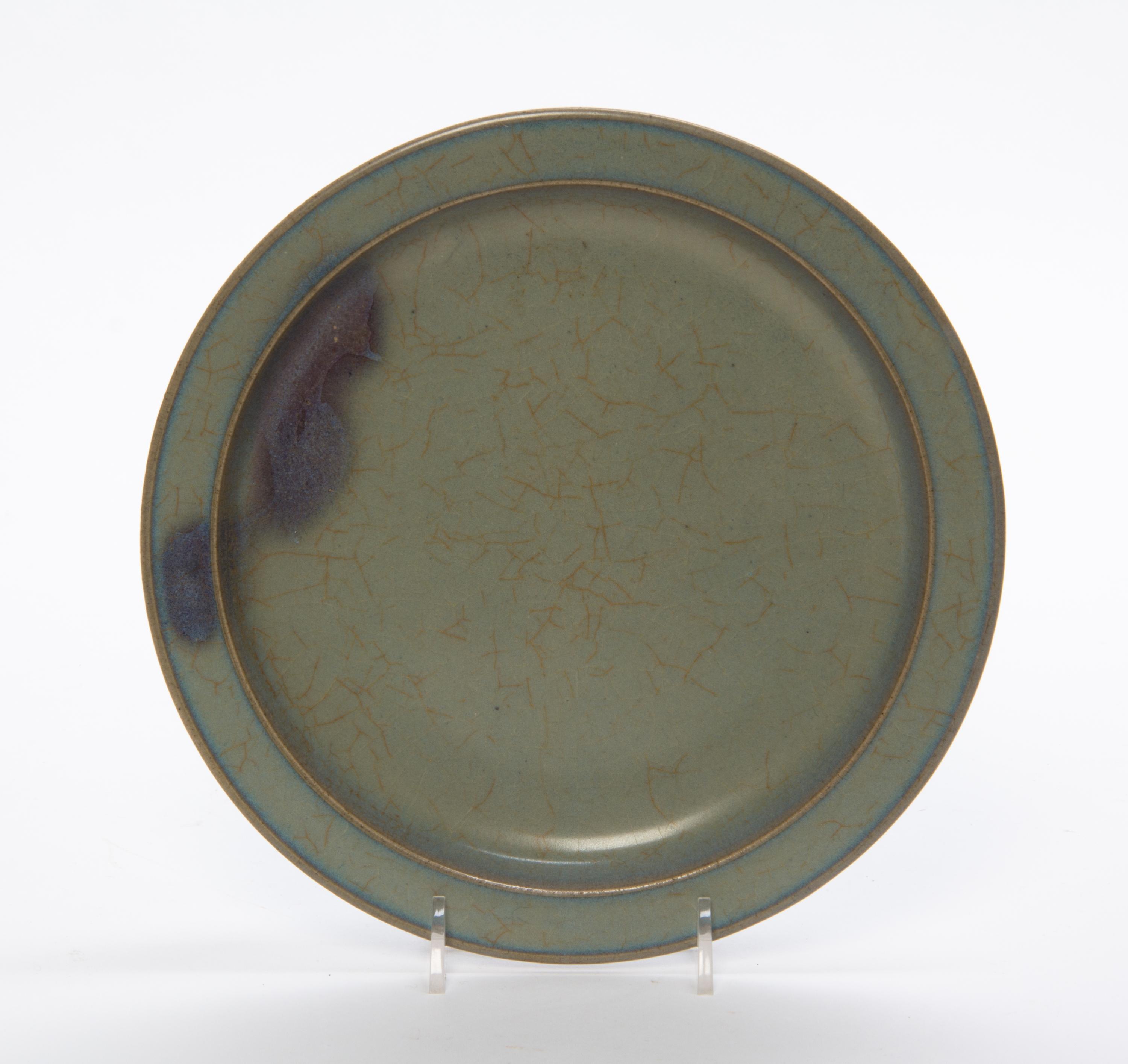 A Chinese Junyao Glazed Stoneware Plate Diameter 8 3/4 inches.