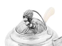 A Georg Jensen Silver Blossom Three-Piece Tea and Coffee Service