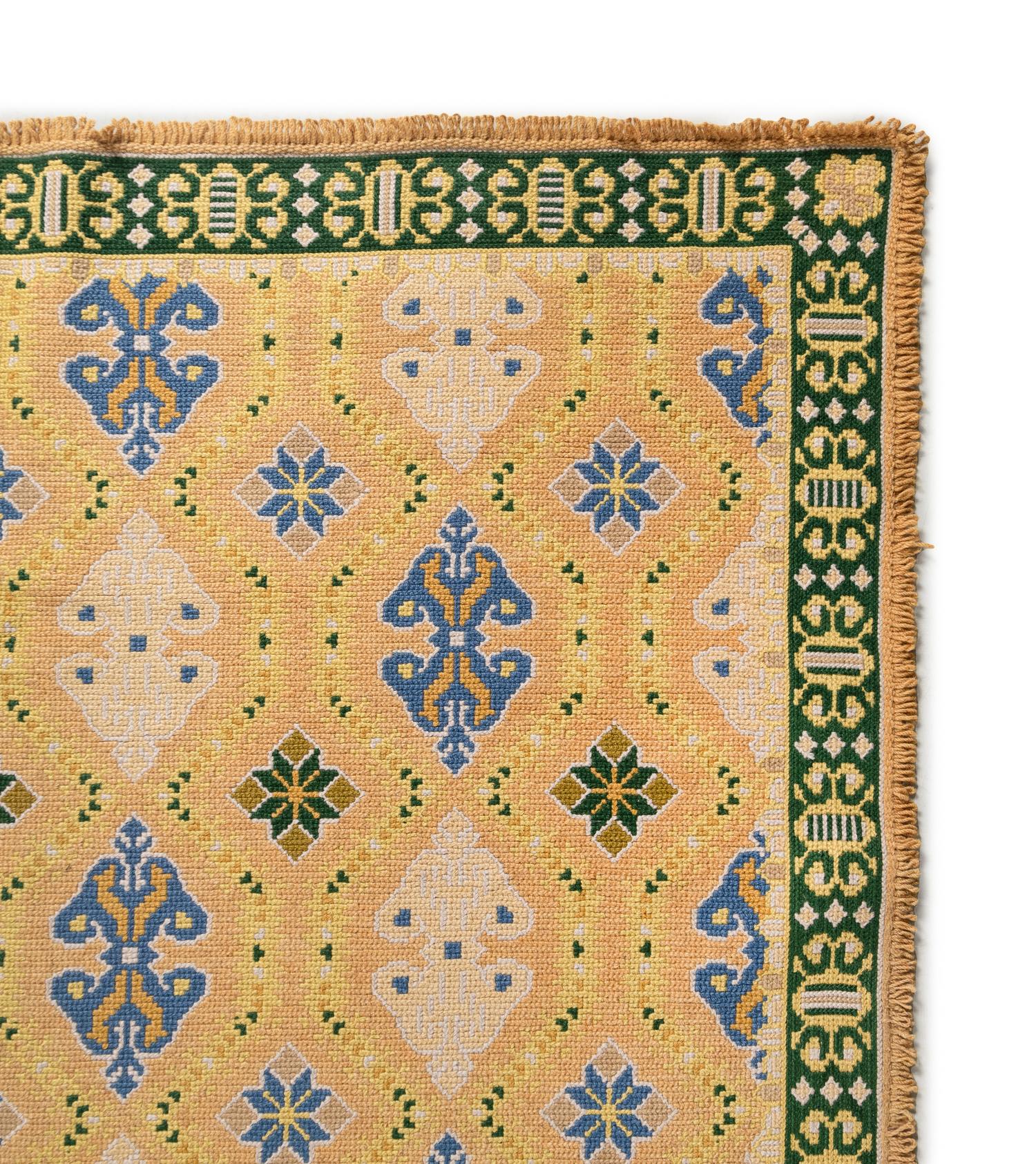 A Portuguese Needlepoint Rug