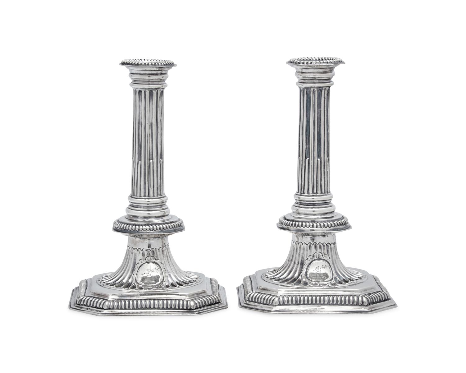 A Rare Pair of William III Britannia Silver Candlesticks