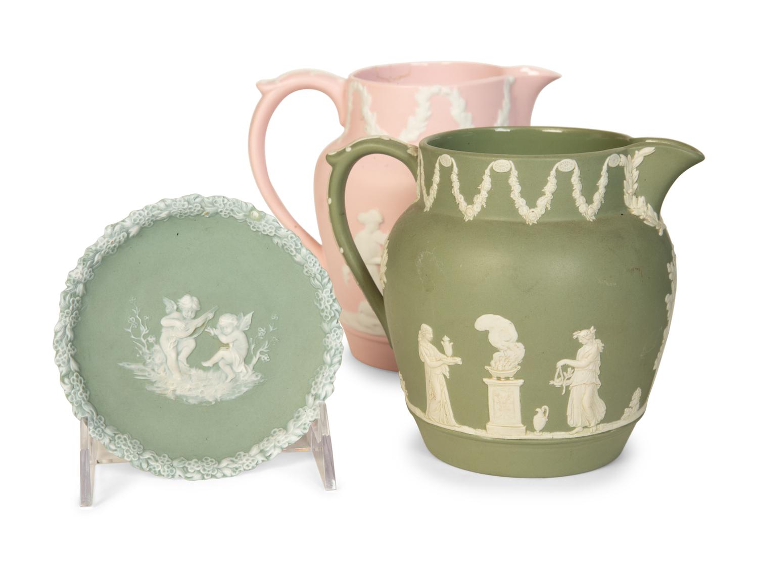 Seven Jasperware Pitchers and Table Articles