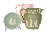 Seven Jasperware Pitchers and Table Articles