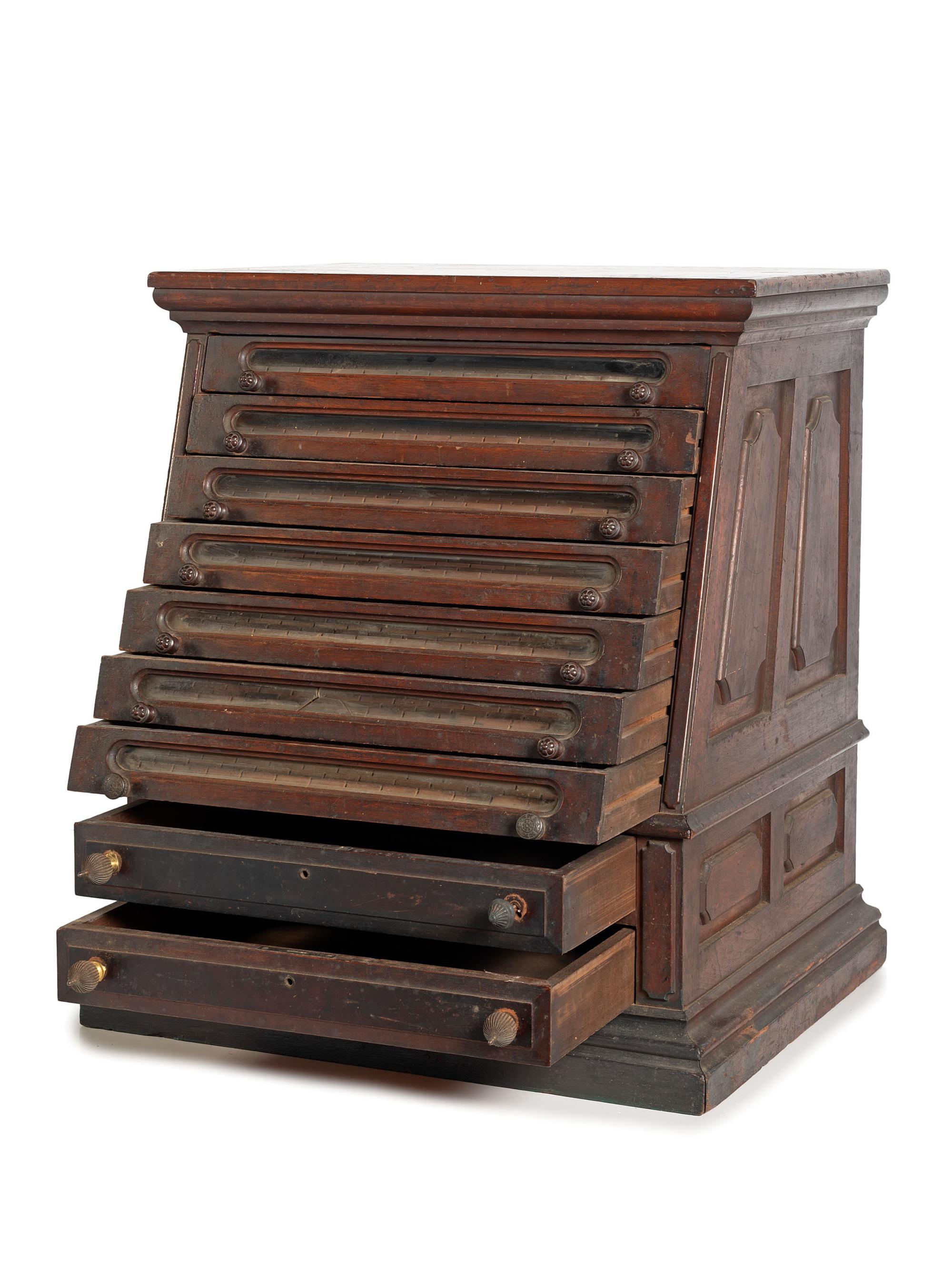 A Nine Drawer Counter Top Spool Cabinet