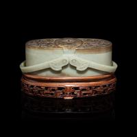 A Chinese Pale Celadon and Russet Jade Box and Cover, 20th Century 近代 青玉提梁式蓋盒