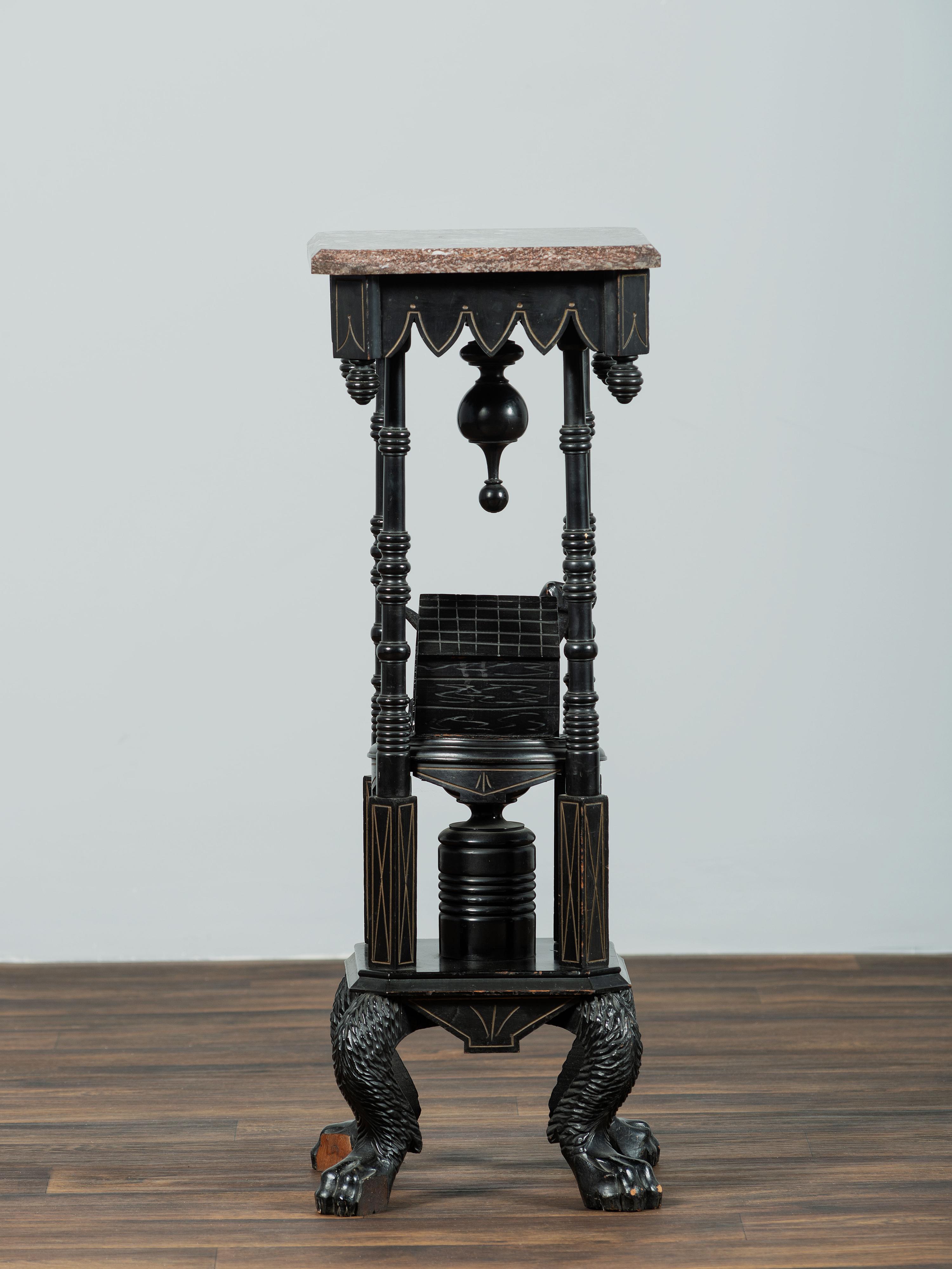 A Victorian Marble-Top Carved and Ebonized Parlor Table with Dog