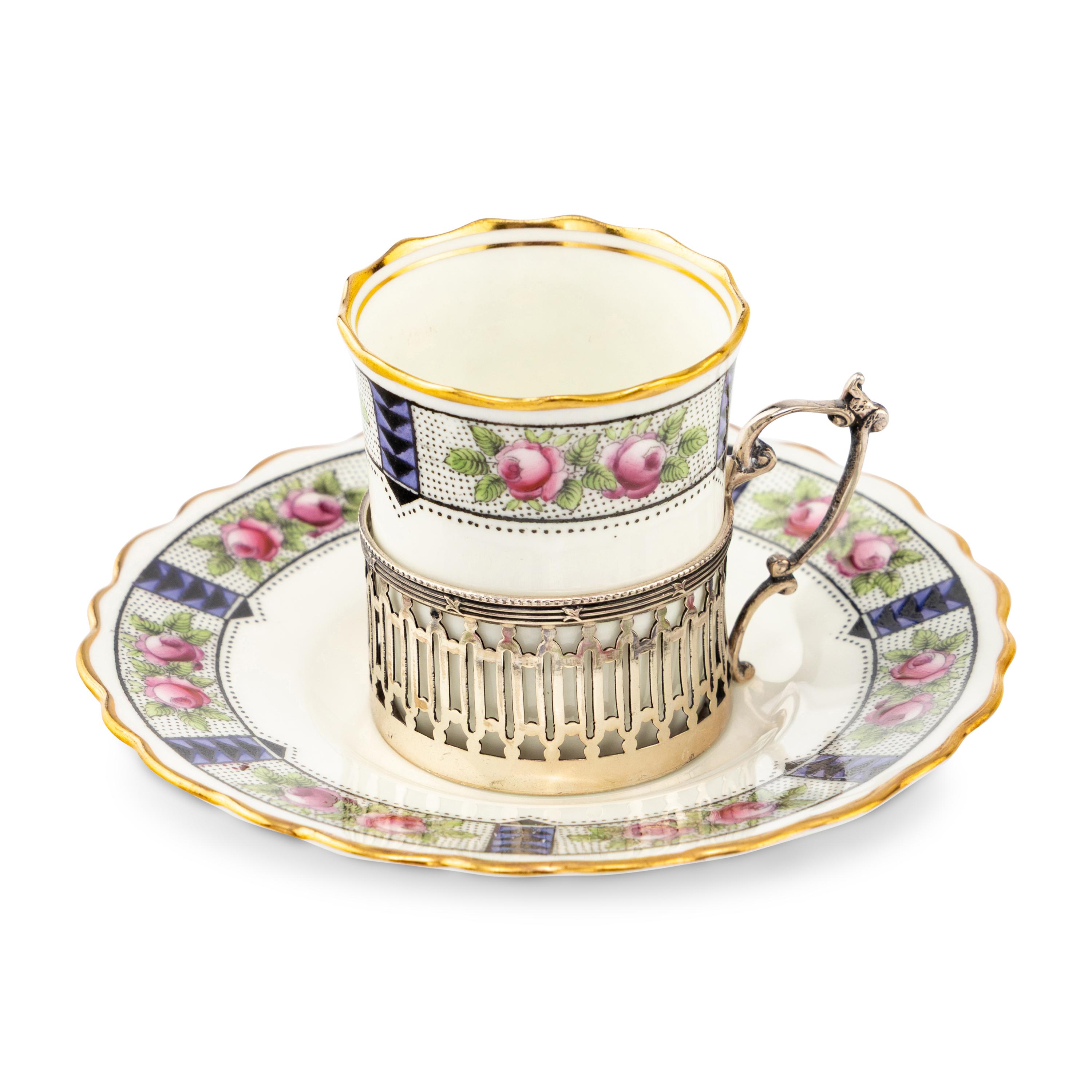 A Set of Six Aynsley Porcelain Coffee Cups and Saucers with Silver Liners