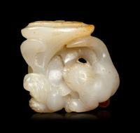 A White Jade 'Cat and Butterfly' Carving