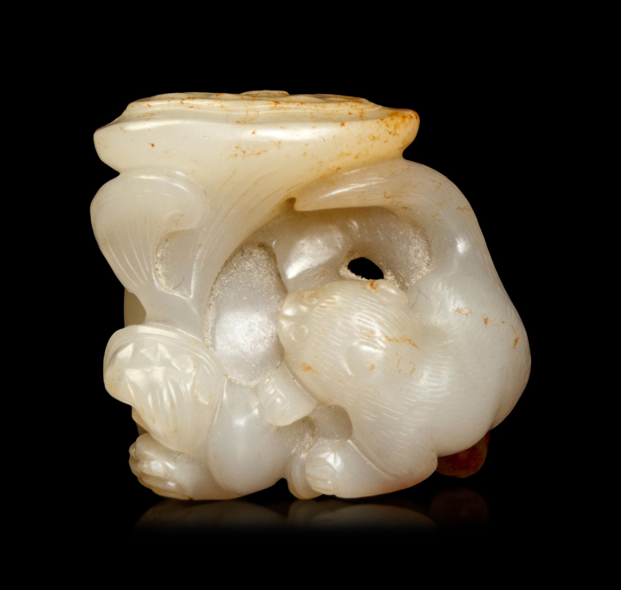 A White Jade 'Cat and Butterfly' Carving