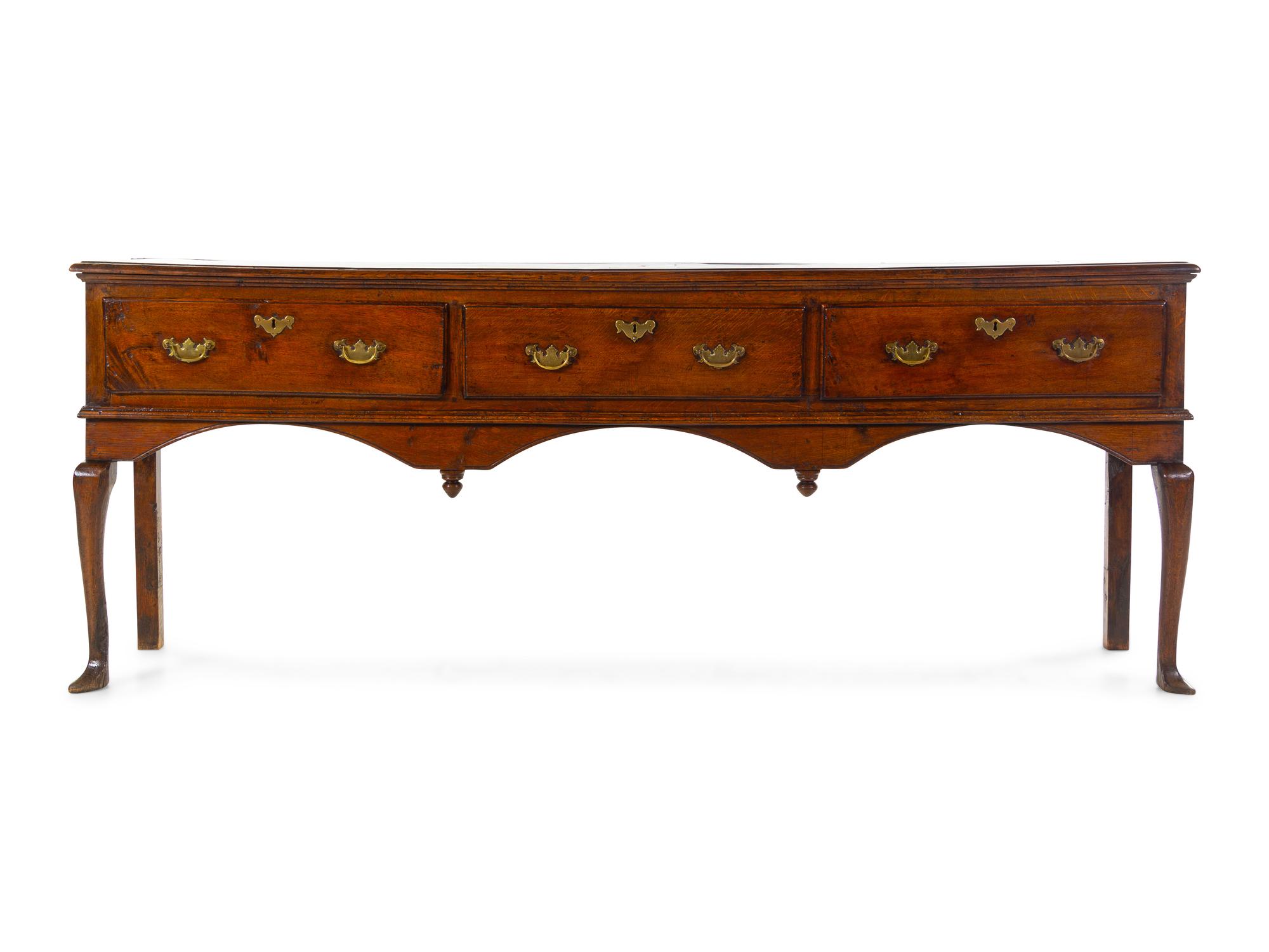 A George III Provincial Oak Sideboard