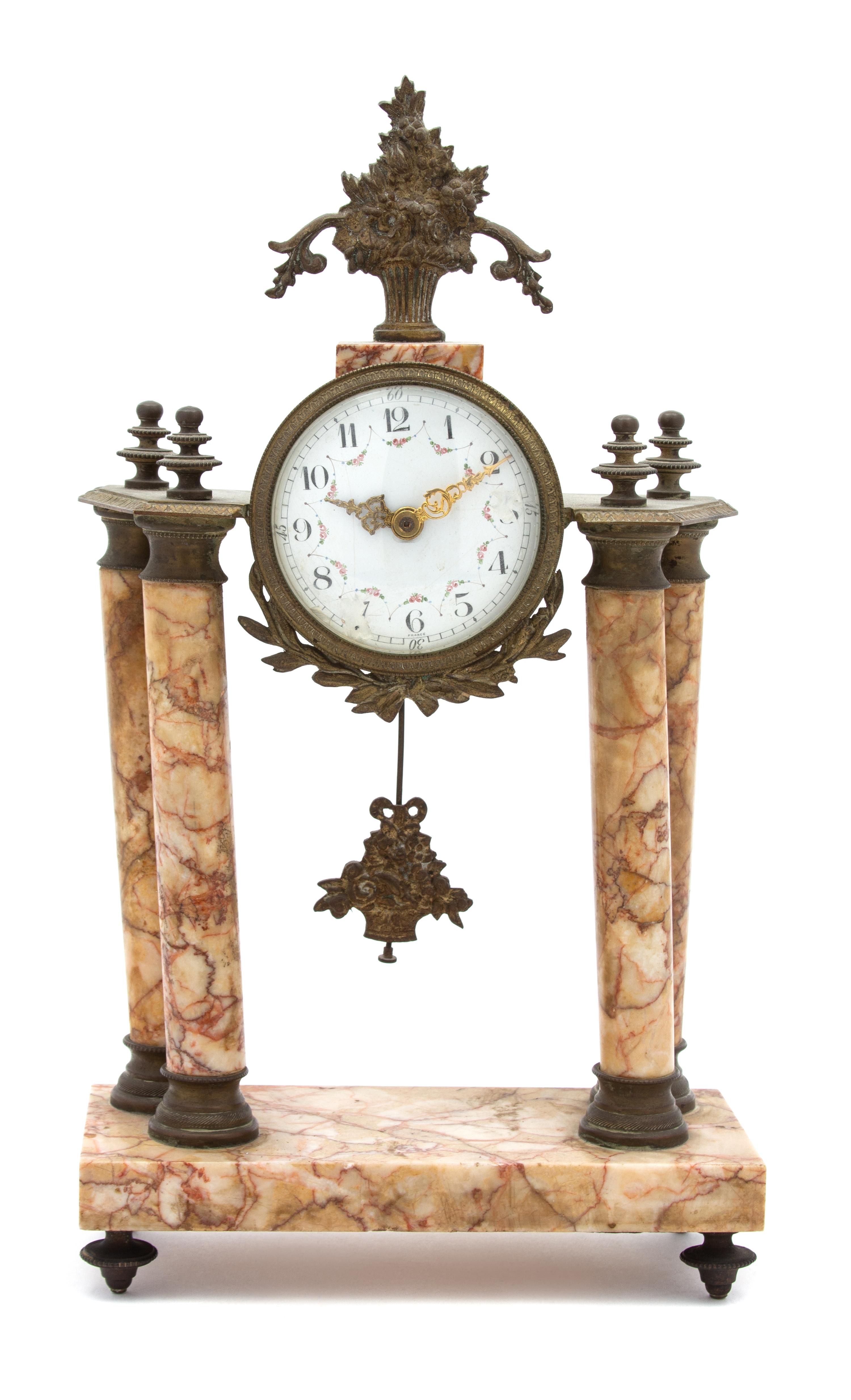 A French Gilt Bronze and Marble Portico Clock