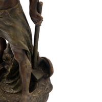 A Cast Metal Figural Newel Post Lamp