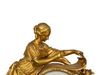 A Louis XVI Gilt Bronze Mounted Marble Mantel Clock