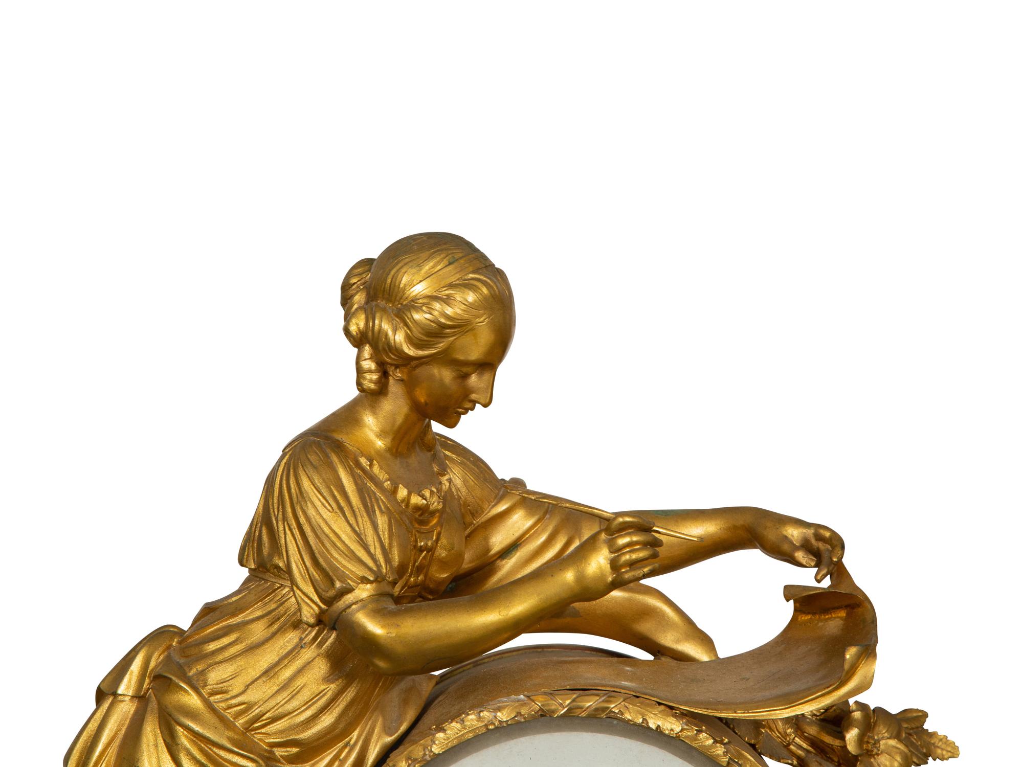 A Louis XVI Gilt Bronze Mounted Marble Mantel Clock