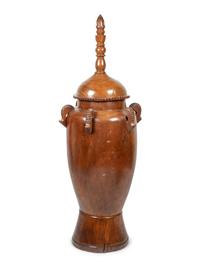 A Monumental Carved Hardwood Urn and Cover