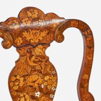 An assembled pair of Dutch Rococo inlaid walnut and marquetry side chairs circa 1750