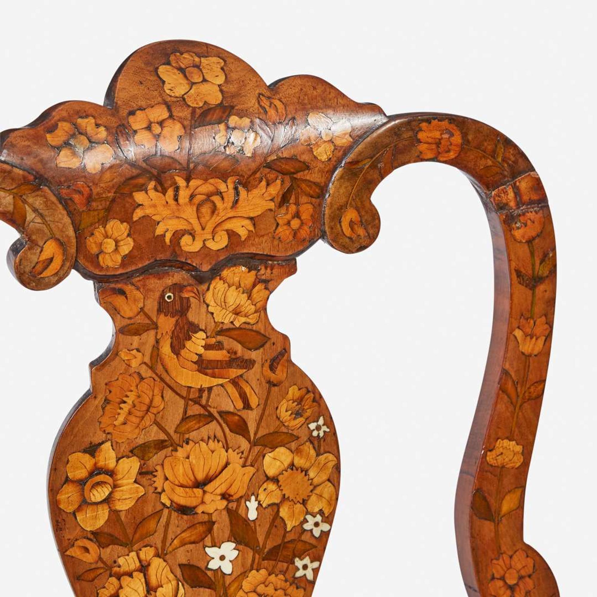 An assembled pair of Dutch Rococo inlaid walnut and marquetry side chairs circa 1750